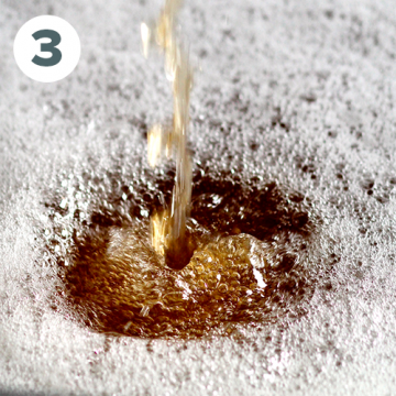 a clear and gold juice